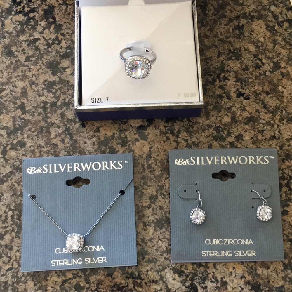 Sterling silver ring, necklace, and earrings